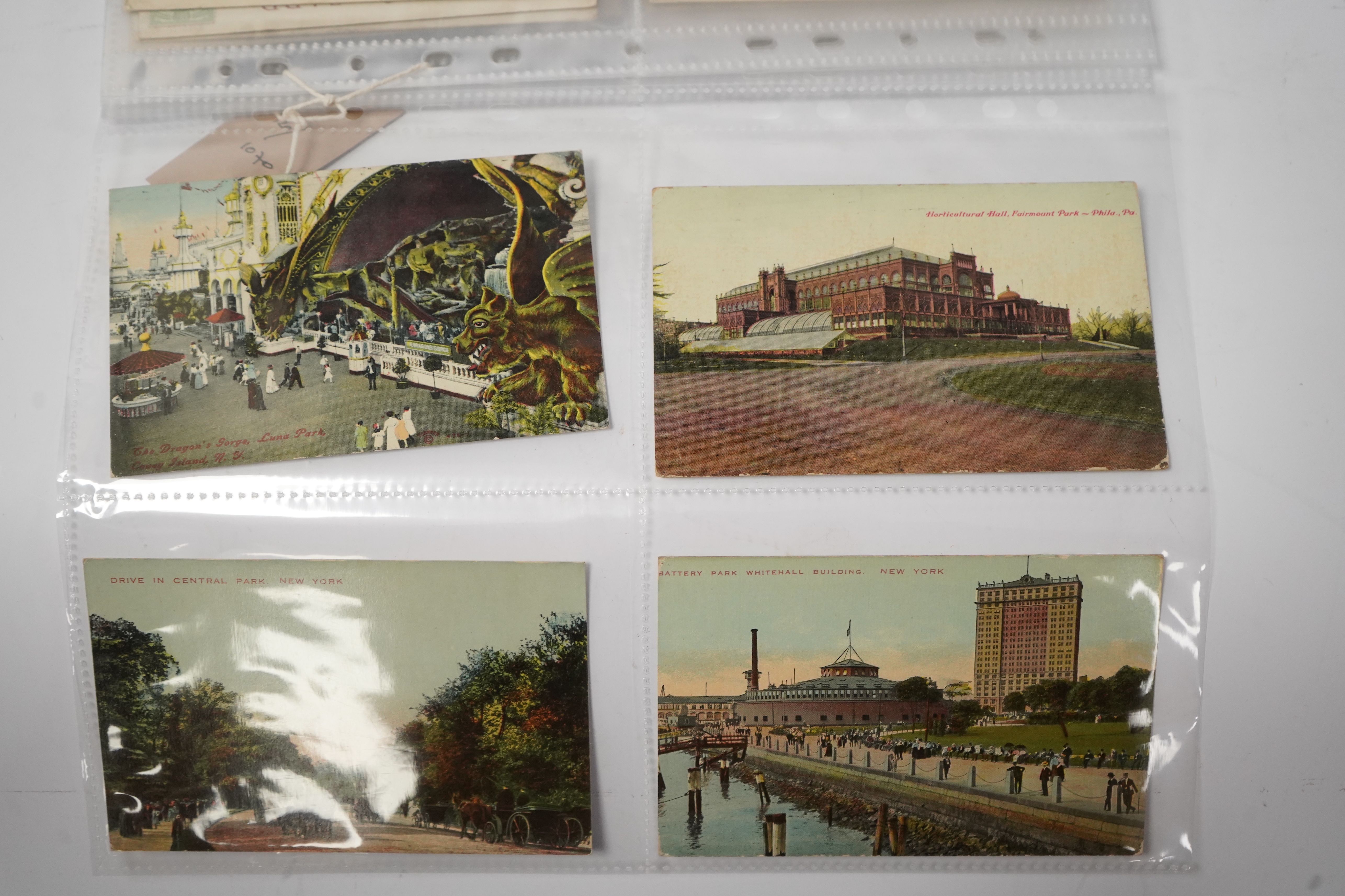 A group of eighty eight assorted vintage postcards, including American topography, rail accidents and motoring.